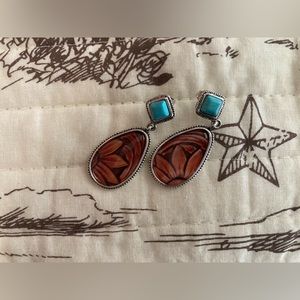Western tooled earrings.
